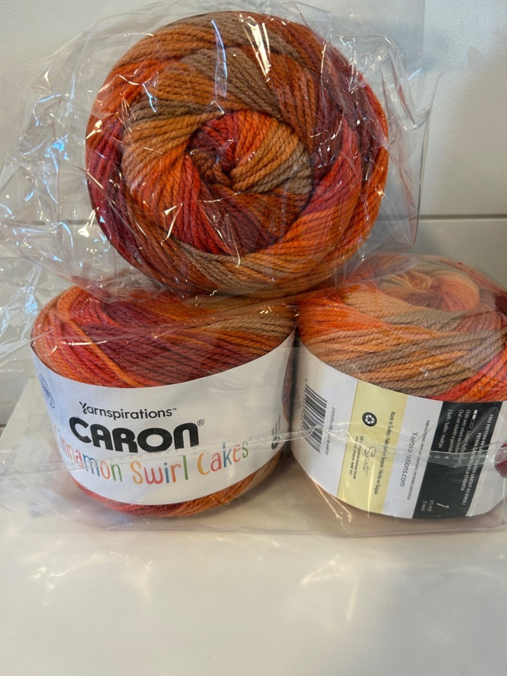 3 Caron Cinnamon Swirl Cakes Variegated Yarn - heatwave
